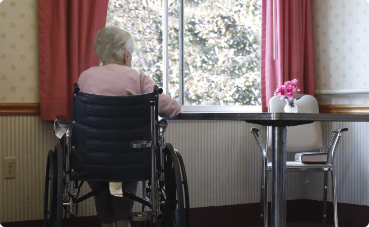 A patient on a wheelchair showing signs of sexual abuse in nursing homes