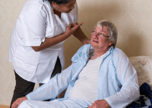 A nurse wanting to physically abuse an elderly woman in a nursing home